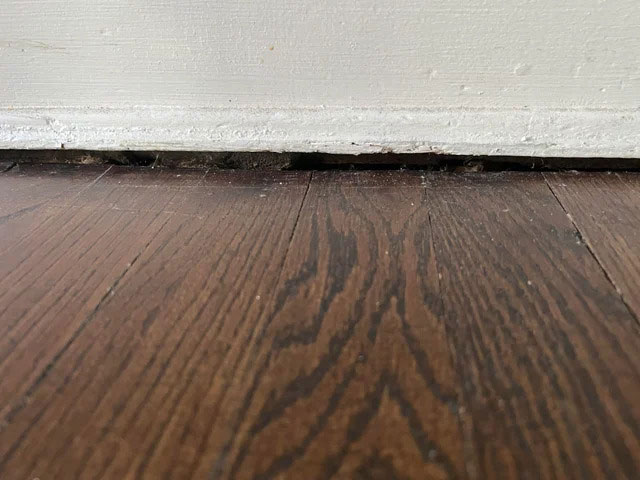 gap between the floor and baseboard foundation issue 1