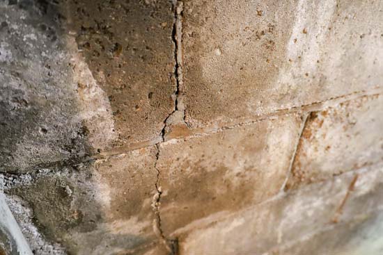 Image of vertical foundation wall crack caused by foundation settlement